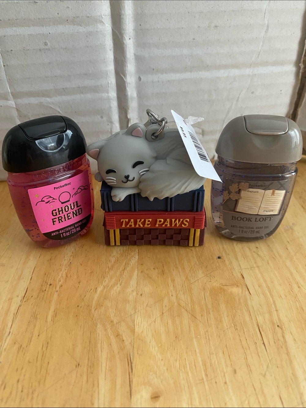Bath & Body Works set. Gel holder bag charm w cat on books & 2 hand gels NWT